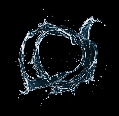 Water splash isolated on black backgroundの写真素材