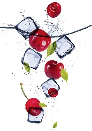 Fresh cherries with ice cubes, isolated on white backgroundの写真素材