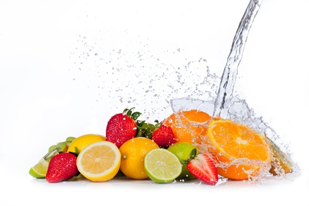 Fresh fruit with water splash, isolated on white backgroundの写真素材