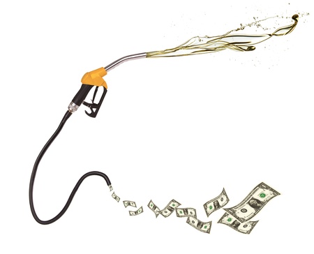 Concept of dollar banknotes and petrol splashing out of pistol, isolated on white backgroundの写真素材