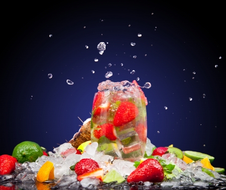 Fruit cocktail with dark backgroundの写真素材
