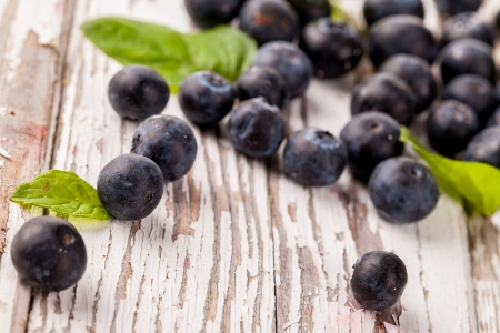 Fresh blueberries on wooden tableの写真素材