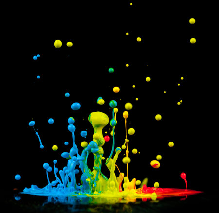 Colored splashes isolated on black background