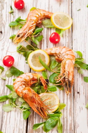 Fresh served grilled prawns on woodの写真素材