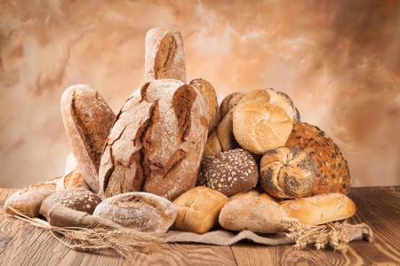 various kinds of bread on woodの写真素材