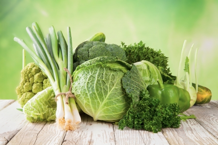 Various kinds of vegetable on wooden deskの写真素材