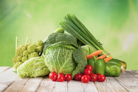Various kinds of vegetable on wooden deskの写真素材