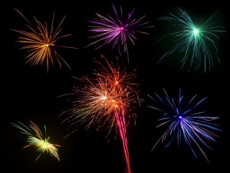 Isolated shots of fireworks blasts on black backgroundの写真素材