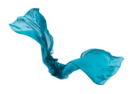 Isolated shot of freeze motion of transparent blue silk, isolated on white backgroundの写真素材