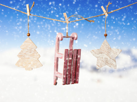 Hand made cloth decoration hanging on rope. Blur abstract mountain background