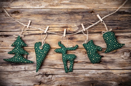 Home made traditional cloth decoration on wooden planksの写真素材