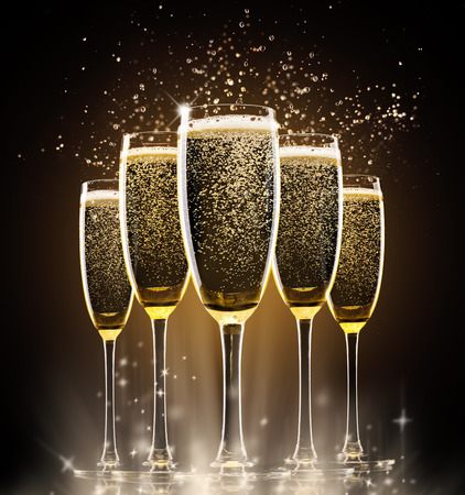 Collection of glasses of champagne on black backgroundの写真素材