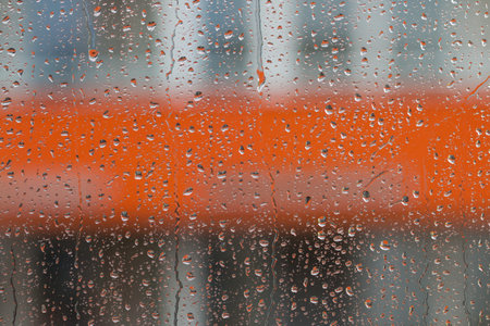 Detail of raindrops on window glass, low depth of focus
