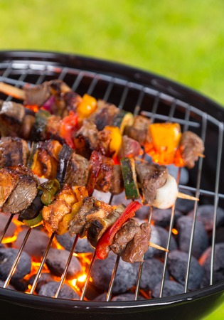 Delicious vegetable and meat skewer on grillの写真素材