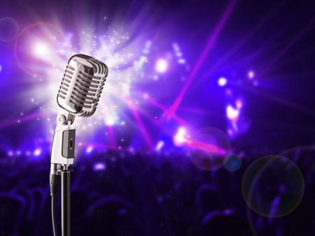 Retro microphone ready for singer, blur crowd of people on background