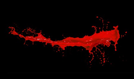 Red paint splash isolated on black backgroundの写真素材