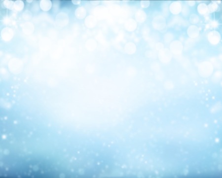 Abstract snowy blur winter background with spotlightsの写真素材