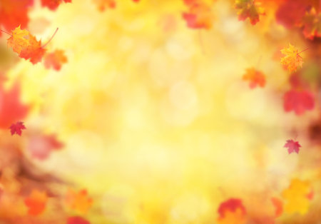 Abstract blur autumn background with falling leaves, copyspace for text