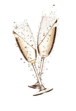 Two glasses of champagne with bubbles, isolated on white backgroundの写真素材