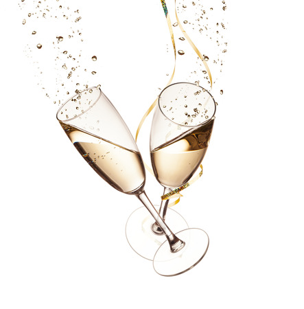 Two glasses of champagne with bubbles, isolated on white backgroundの写真素材