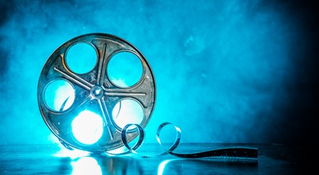 Old reel of film with smoke and backlightの写真素材