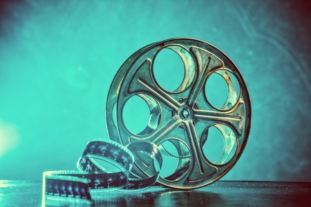 Old reel of film with smoke and backlightの写真素材