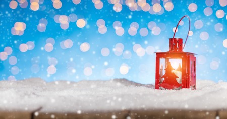 Christmas background with red lantern, blur abstract blue background.の写真素材