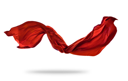 Smooth elegant red transparent cloth separated on white background. Texture of flying fabric.の写真素材
