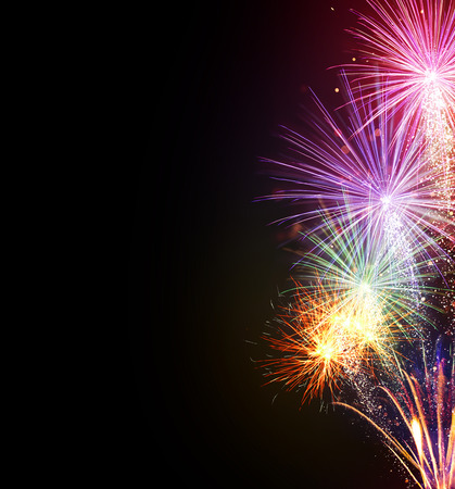 Fireworks explosions isolated on black background. Free space for text. Celebration and success concept. Very high resolution imageの写真素材