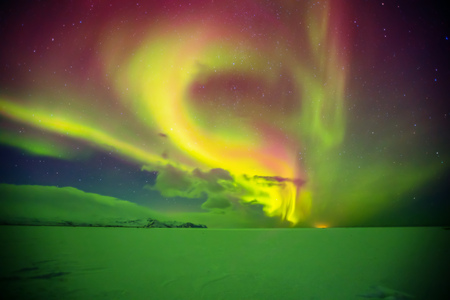 Beautiful aurora borealis northern light in Iceland, shot in early winter periodの写真素材
