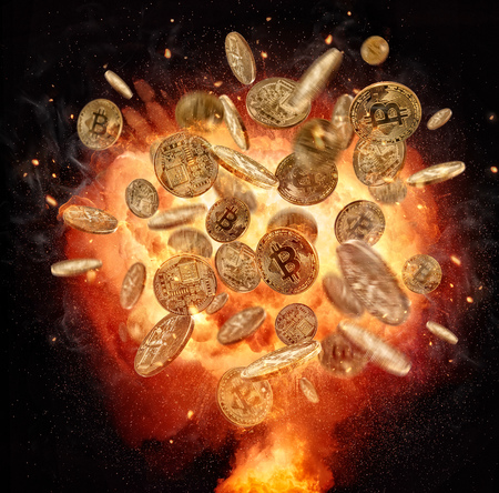 Fire explosion of Bitcoins crypto currency symbol, isolated on black background. Concept of digital currency and risk