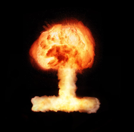 Atomic bomb explosion mushroom isolated on black background.