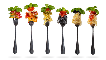 Traditional italian collection of pasta warpped on fork. Isolated on white background. Very high resolution imageの写真素材