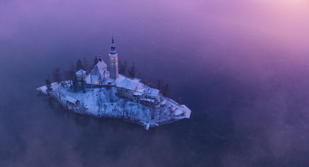 Aerial view of Bled lake in sunrise light, beautiful island with old church. Sloveniaの写真素材