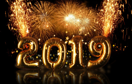 New Year 2019 celebration concept with golden numbers and fireworksの写真素材