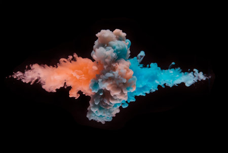 Coloured acrylic ink mixing in water isolated on black background. Abstract art background.
