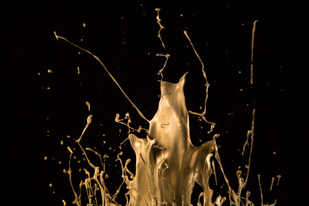 Macro photo of mixed acryl colors isolated on black background. Abstract coloured background.の写真素材