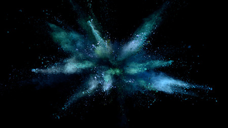 Explosion of colored powder isolated on black background. Abstract colored backgroundの写真素材