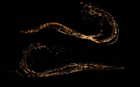 Golden splashes collection isolated on black background. Abstract shapesの写真素材