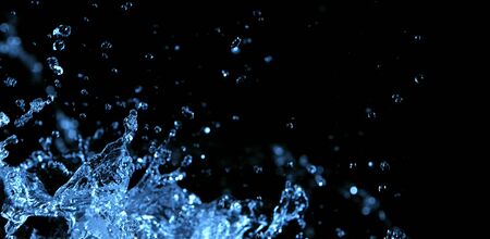 Water splash isolated on black background. Abstract shapeの写真素材