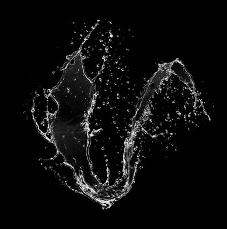 Water splash isolated on blackの写真素材