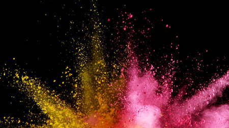 Explosion of colored powder isolated on black