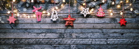 Christmas background with wooden decorations and spot lights. Free space for text. Celebration and...