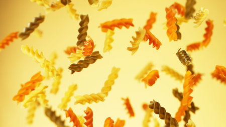 Freeze motion of flying uncooked fusilli pasta, food preparation conceptの写真素材