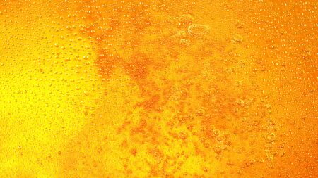Detail of beer drink with bubbles, super macro shotの写真素材