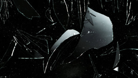 Detail of shattered glass on black background. Texture of broken glass.