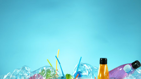 Pile of empty plastic waste, concept of plastical pollution. Free space for text.