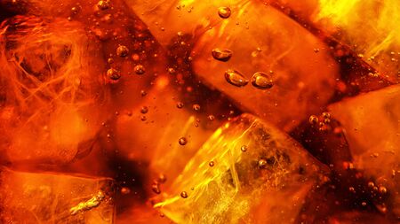 Detail of cola drink with ice cubes, fresh beverages background.の写真素材