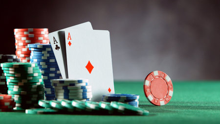 Poker still life with rotating poker chip . Concept of hazard gaming, free space for text.