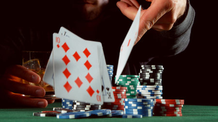 Poker player throwing cards. Concept of hazard gaming, poker chips on table